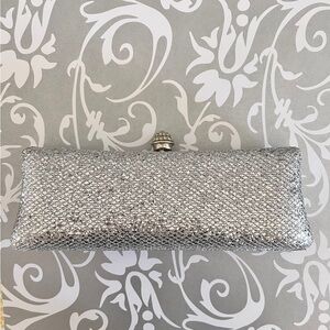 J. Furmani silver hard case clutch purse with jeweled clasp and silver chain